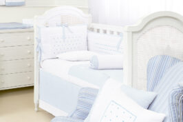 Decifrando o enxoval: diferença entre protetor de berço, rolinho e trança